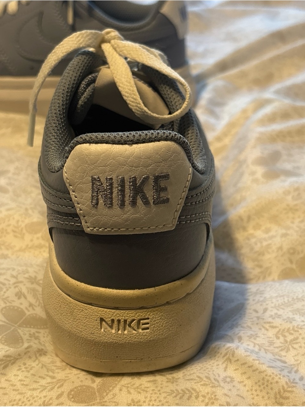 Nike  Women’s  Low-Top Sneakers in Gray and Cream